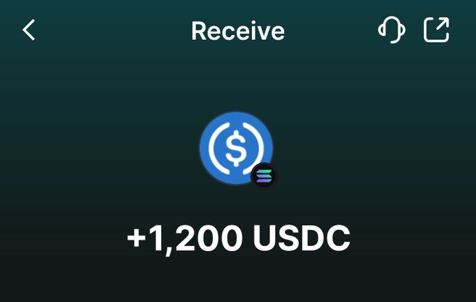 The image displays a "Receive" screen showing a payment of +1,200 USDC (a USD Coin stablecoin) being received on the Solana blockchain, indicated by the Solana logo in the corner. This appears to be from a crypto wallet app celebrating a win of 1,200 USDC, likely tied to a web3 gaming or trading achievement referenced in the caption "Another OCT Win tnx web3 i love it."