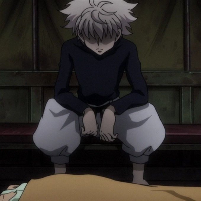 The image shows an anime character with white hair covering his eyes, wearing a dark long-sleeved shirt and light pants, sitting slumped on a bench in a dimly lit room. The caption humorously reflects on the poster's disappointment at sleeping in while others profited, with the character's dejected, downcast posture perfectly capturing the mood of missing out on financial gains from @world_xyz.