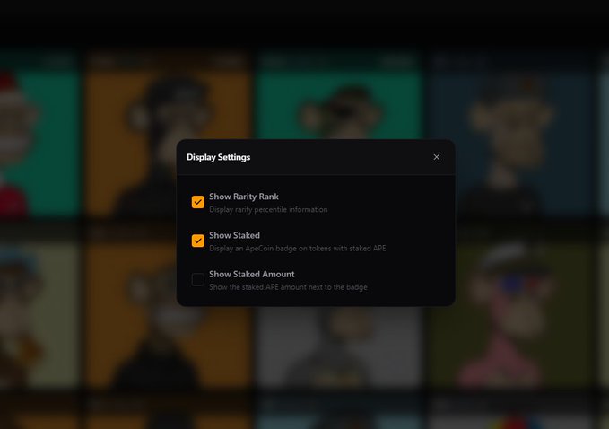 The image shows a screenshot of a web page with a filter applied to an asset collection for @BoredApeYC. The filters allow users to view the assets and claim them directly if they own the NFT. To apply these filters, one needs to click on the "Display settings" button located at the top left corner of the screen, which would reveal the different options available. One option is the "@BoredApeYC", another is a custom rank setting, and the third is an information setting for displaying stakes. The filter is currently applied to a specific collection within the @BoredApeYC NFT, as indicated by the image's content in the bottom right corner of the screen.