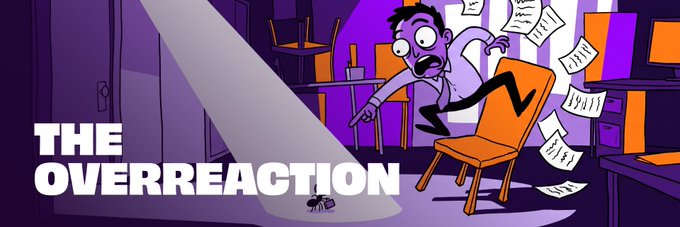 A cartoon image titled "THE OVERREACTION" shows a panicked man leaping from an orange chair as papers fly around him and a spotlight reveals a spider on the floor, humorously exaggerating his reaction to a minor scare—mirroring the post's theme of an overblown emotional response to a phone dying at 1% battery before remembering a charger was in his bag.