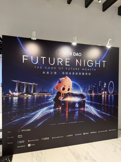 A poster for 'HTX DAO FUTURE NIGHT - THE CODE OF FUTURE WEALTH' event in Singapore during October, featuring a cartoon mascot with a chest, hosted by HTX DAO and co-hosted by AWS, with various media and partner logos.