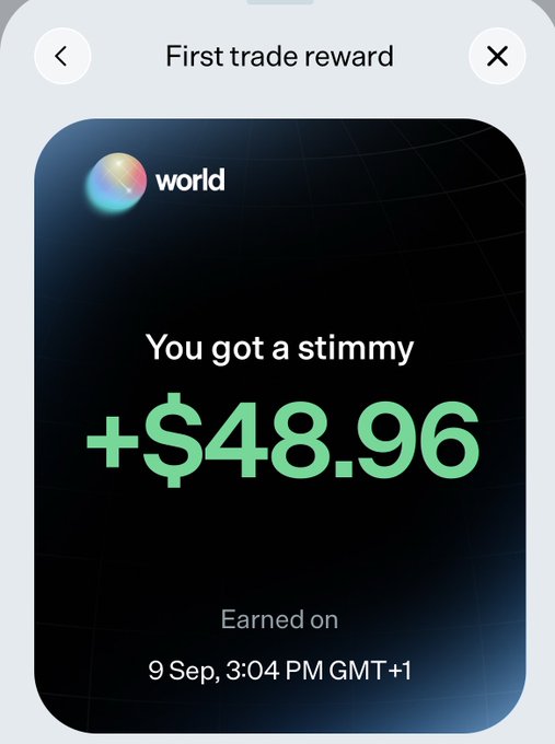 The image shows a "First trade reward" notification from World.xyz, displaying "+$48.96" earned on September 9 at 3:04 PM GMT+1 with the message "You got a stimmy." This screenshot serves as proof of the $48 free reward promised in the post for new users who register through the referral link and make a minimum $3 deposit to trade on the platform.