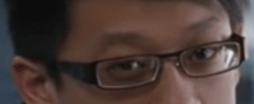 A heavily distorted, vertically-stretched close-up of a man's face wearing glasses is shown, seemingly manipulated for an artistic or surreal effect. The image accompanies a post referencing "gte.xyz," though no text is visible in the image itself.