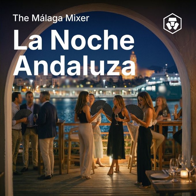 The image shows a group of people standing around at an outdoor event with tables set up for dining. The atmosphere appears to be lively, as several individuals are holding wine glasses and there are chairs available for seating. A large archway can also be seen in the background, adding to the ambiance of the gathering. The post is related to this scene by discussing a Malaga Mixer event happening on June 11th at a restaurant called Tití Casa de Botes.