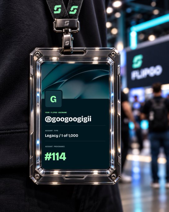 A close-up of a metallic ID badge holder displaying the username "@googogii", "ACCOUNT TYPE: Legacy / 1of1,000", and "#114", worn with a lanyard at a convention.