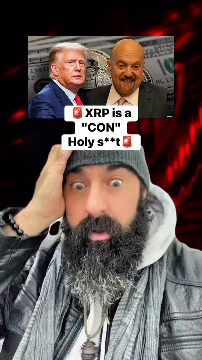 The image features a man with a beard wearing a gray jacket, who has his head tilted back as he looks at the camera. The background of the photo shows two political signs - one for Donald Trump and another for Bitcoin. The text on these signs reads "XRP is a 'CON' Holy". This suggests that the man might be discussing or expressing his opinions about Bitcoin and its relation to cryptocurrency, possibly in response to the political climate surrounding Bitcoin.
