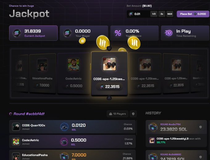 The image shows a computer screen displaying a game interface with various options, including a "JACKPOT" option at the top of the page. The background color of the image is purple, which contrasts with the black text displayed on the screen. The main focus of the image is a small square containing information about a jackpot, and it appears to be related to a game or casino setting.