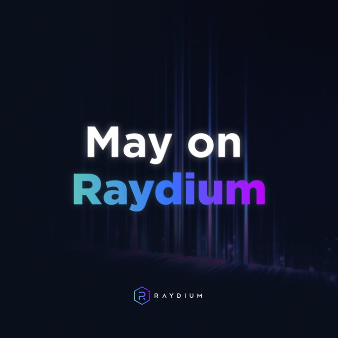 The image shows a dark background with the text "May on Raydium" written in white letters above it. Below this, there are three lines of blue and purple colors, which appear to be rays or beams coming from different directions. The overall scene suggests that the post is related to the cryptocurrency market, possibly discussing the performance of Raydium or a similar digital currency.