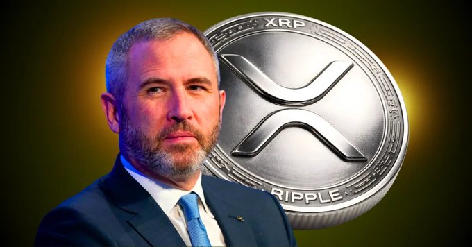 A man with a beard in a suit is pictured beside a large XRP coin displaying the Ripple logo, illustrating Brad Garlinghouse's viral 5-year bullish message about XRP's long-term growth potential.