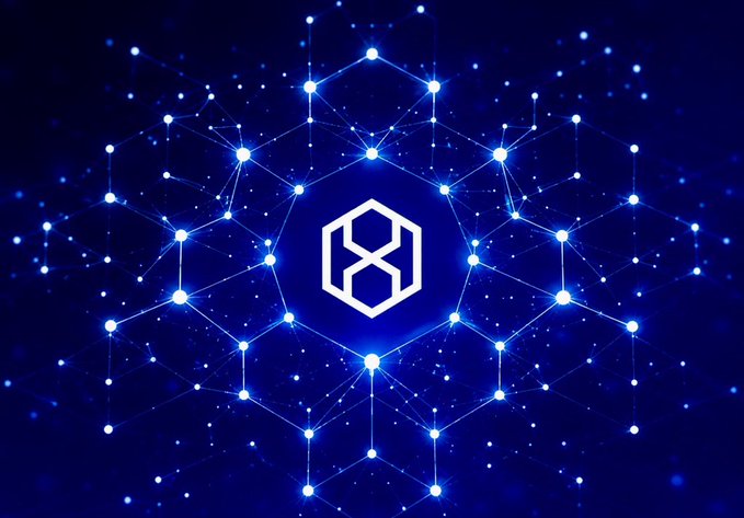 A digital graphic displays a glowing white hexagonal logo against a deep blue background filled with connected nodes and sparkling lights.
