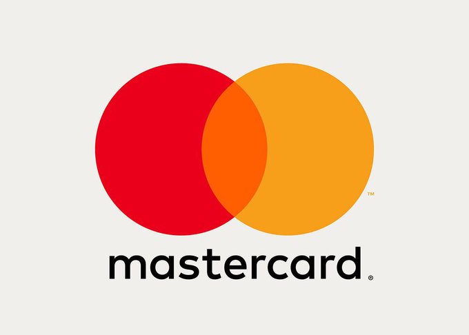 The image displays the modern Mastercard logo featuring two overlapping circles (red and yellow-orange) above the "mastercard" wordmark. This relates to the post by visually reinforcing the "MASTERCARD" reference alongside the ticker "$XRP," likely suggesting a potential partnership or integration between the two in the cryptocurrency payment space.