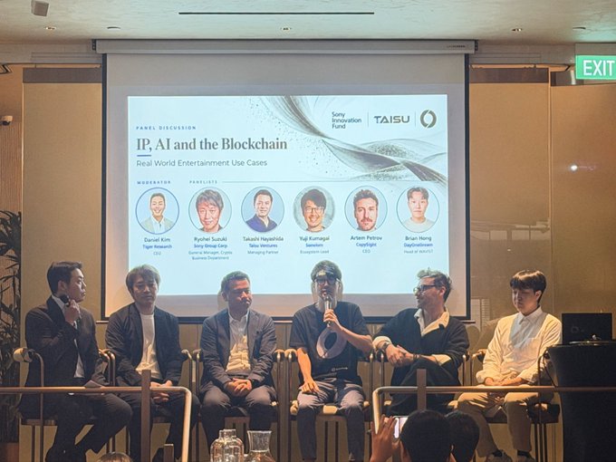 Panel discussion at a Sony Innovation Fund and TAISU event titled 'IP, AI and the Blockchain: Real World Entertainment Use Cases', featuring panelists including Daniel Kim (Tiger Research), Ryuhei Suzuki (Sony Group Corp), Takashi Hayashida (Taku Ventures), Yuji Kumagai (hamsense), Artem Petrov (Copyflight), and Brian Heng (Rightbalance).