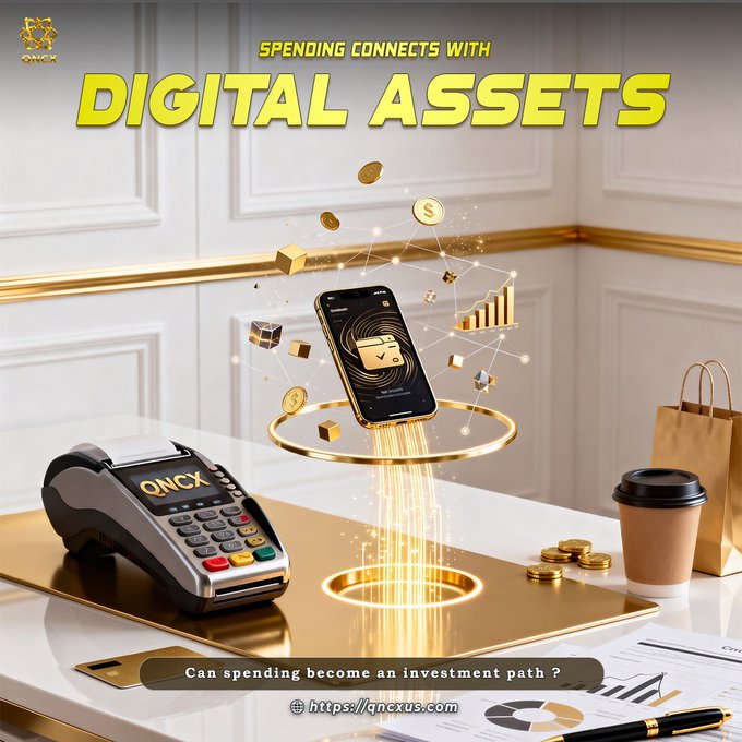 The image is a promotional graphic titled "SPENDING CONNECTS WITH DIGITAL ASSETS," featuring a POS terminal and smartphone emitting glowing digital particles, coins, and a rising chart against a luxurious gold-and-white backdrop, with a coffee cup and shopping bag representing everyday purchases. The QNCX logo appears in the corner, and the caption asks "Can spending become an investment path?" directing viewers to qncxus.com—visually reinforcing the post's message that routine transactions can be transformed into tokenized stock rewards and digital asset accumulation.