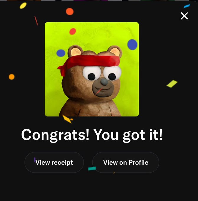 Congratulations screen featuring a clay-style bear with googly eyes and a red headband, with text 'Congrats! You got it!' and buttons for 'View receipt' and 'View on Profile'.