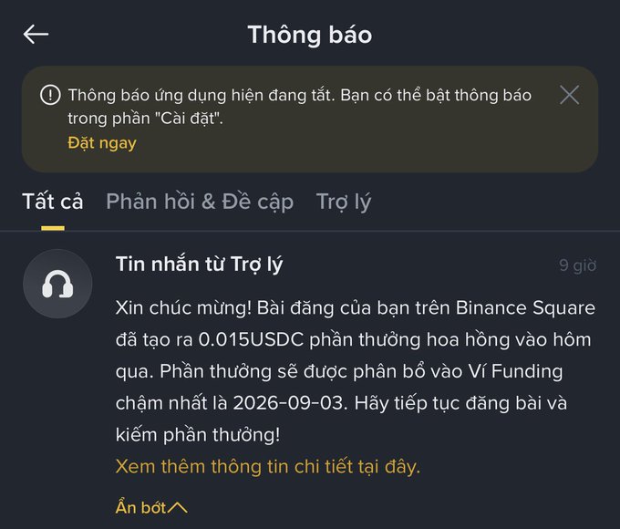 A Vietnamese Binance app notification screen titled 'Thông báo' (Notifications) shows a system notification that app notifications are turned off, along with a message from support about earning 0.015 USDC reward.