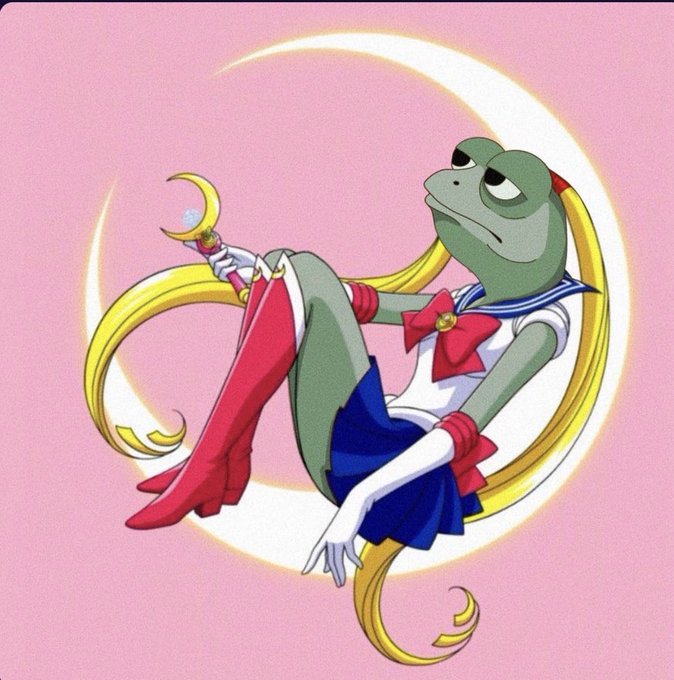 An anime-style illustration of a frog-like character with long blonde hair wearing a Sailor Moon-style schoolgirl uniform, posed against a pink background with a crescent moon.