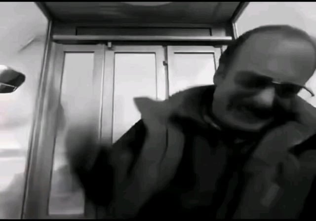 The image shows an older man wearing glasses, talking on his cell phone while standing inside an elevator. He appears to be in a rush or perhaps experiencing some sort of urgency as he talks on the phone. The photo has been edited with black and white tones, giving it a vintage appearance that contrasts with the modern context of using a cell phone for communication.

The post seems to be related to the popular social media platform called r/ASTSpaceMobile, where users share their experiences or discuss various topics. The image's caption reads "RDW shorts waking up to a margin call Similar to r/ASTSpaceMobile". This suggests that the man in the photo might have been discussing some news or information about RDW shorts and how it relates to his current situation inside the elevator, possibly due to an unexpected event or change in plans.