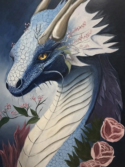 A detailed painting of a blue and white dragon's head with golden eyes, surrounded by delicate pink flowers and green leaves.