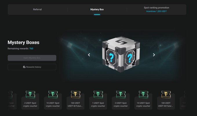 The image displays the "Mystery Box" tab of Bitget's Trading Club, showing 760 remaining rewards and a row of available prizes including USDT spot crypto vouchers and M Futures vouchers in varying amounts (1, 2, 10, and 100 USDT). A central metallic cube with question marks represents the unopened mystery boxes, illustrating one of the reward-earning opportunities mentioned in the post.