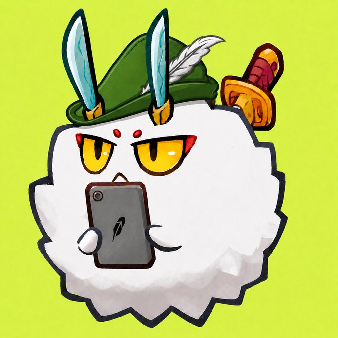 The image features a cute cartoon character wearing a green hat with white horns holding a black phone that says "AXS" on it. The character also has an angry expression, adding intensity to its overall appearance. The image seems to be related to a discussion about cryptocurrency trading and Robinhood App, as the text in the image states that "AXS has been listed on @RobinhoodApp", indicating a possible connection or recognition of the brand by others who have used the platform for trading purposes.