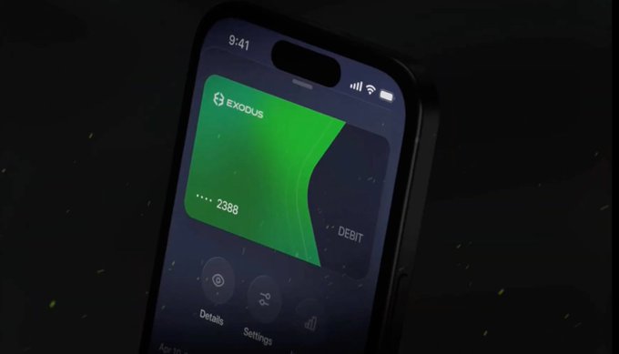 A smartphone displays the Exodus crypto wallet app with a green debit card showing a balance ending in 2388, visually representing the company's expansion into payments and its growing transaction revenue highlighted in the post.