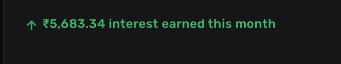 A celebration of earning ₹5,683.34 in interest this month, humorously suggesting the amount could fund a GTA 6 purchase. The green upward arrow and bold text emphasize a sense of financial achievement, tying into the post's playful boast about affording the game through interest alone.