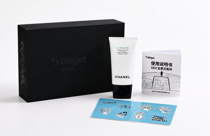 The image features a Chanel gift set that includes a Chanel face wash and a small booklet with stickers of cartoon characters, likely for children's drawings. The gift set is presented in a black box, which has a white label on top displaying the Chanel logo. The post mentions "Happy Children's Day" and encourages people to participate in a giveaway where they can win a Chanel face wash by drawing one of the cartoon characters from the booklet.