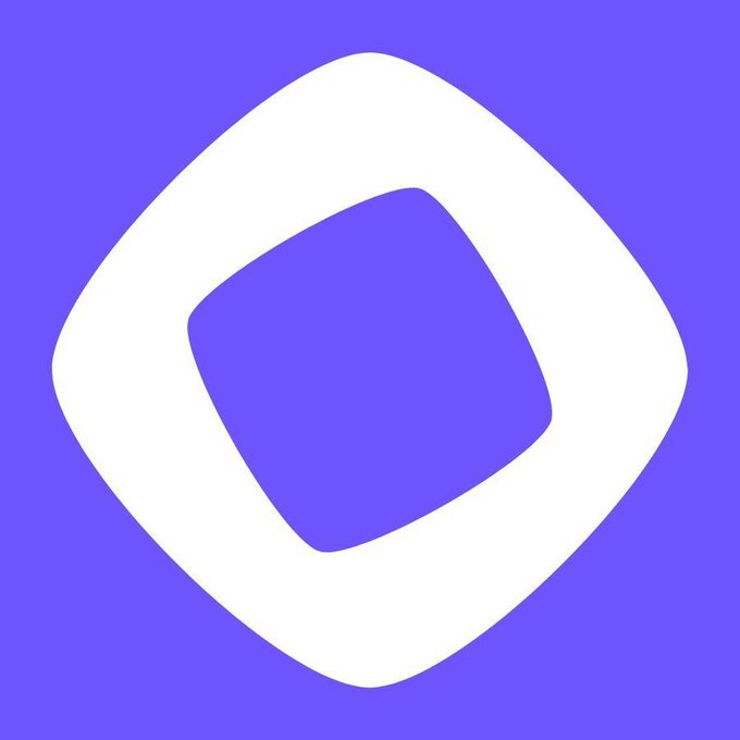 A purple background featuring a white, rounded diamond-shaped logo with a smaller, tilted square cutout in the center.