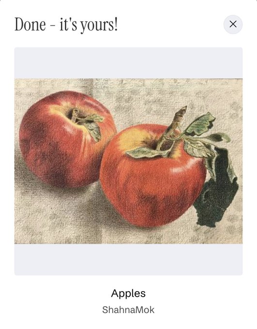 A confirmation screen titled 'Done - it's yours!' displaying a colored pencil drawing titled 'Apples' by 'ShahnaMok', depicting two red apples on a textured surface.