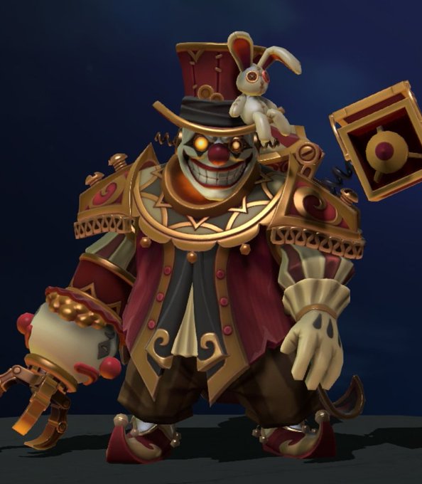 A sinister jester-like Clockwerk figure with a menacing grinning face, glowing orange eyes, and a tall red-and-gold top hat stands in ornate clockwork-style attire featuring a harlequin-patterned vest, mechanical prosthetic hand, and pointed elf-like shoes, while a white plush bunny with red stitched details perches on his shoulder beside a small banner displaying a clock face emblem—illustrating the "Grand Master of Traveling Circus" cosmetic set for the Clockwerk hero from Dota 2, as referenced in the accompanying post comparing it to the newer "Quartero's Curios" set.