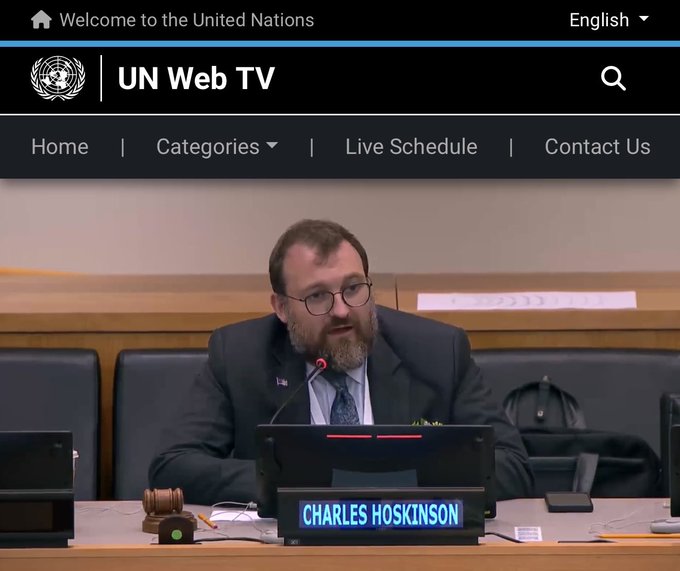 A screenshot from UN Web TV showing Charles Hoskinson, identified by the nameplate, speaking at a podium during a United Nations meeting.