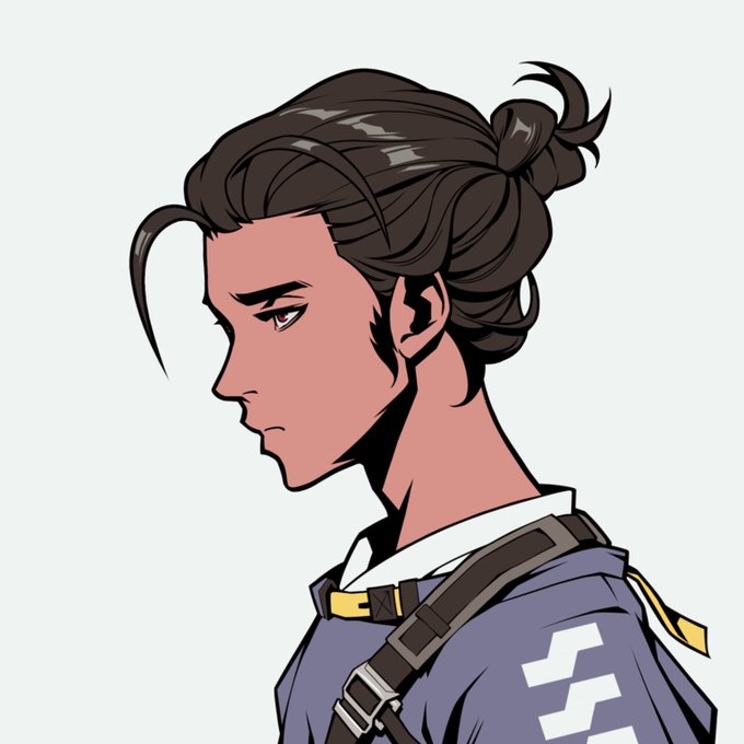 The image features a man with long hair wearing a blue shirt, which has a yellow tag attached to his shoulder. The man's face is turned away from the camera, giving him an intense look as if he is deep in thought or contemplating something. There are no texts present in the image, and it does not contain any other objects besides the man with long hair and the yellow tag on his shoulder.