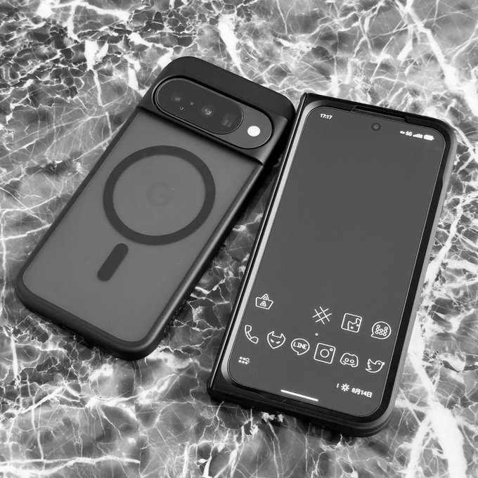 The image shows a Google Pixel smartphone displayed both face-up, revealing a home screen with apps like Reddit, Twitter, and LINE, and face-down to showcase its case with a magnetic ring and camera bar, resting on a black marble surface—visually representing the privacy-focused "AnonymPhone" highlighted in the post.