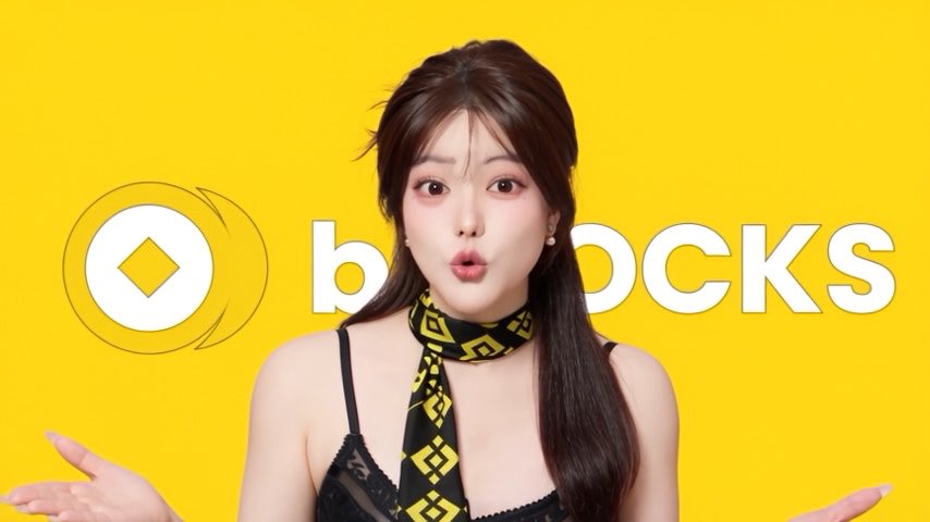 A young woman with dark hair poses with her hands outstretched against a bright yellow background, wearing a black lace top and a black and yellow patterned scarf, with 'blooks' text visible behind her.
