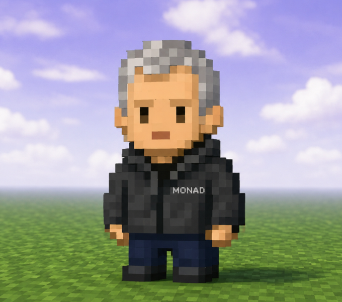 A 3D voxel-style character of an older man with gray hair and a beard, wearing a black jacket with 'MONAD' written on it, stands on a grassy field.