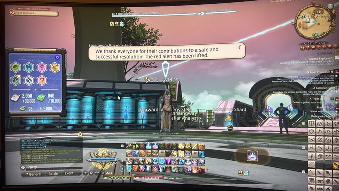 A Final Fantasy XIV player stands in the N.5 - WINDS area as an emergency broadcast announces "We thank everyone for their contributions to a safe and successful resolution! The red alert has been lifted." The interface shows a Cosmic Exploration quest ("Queue at your leisure"), with 2,658/30,00 currency and 645/10,00 MGF, reflecting the game's MMO community efforts that the poster jokingly compares to shilling a crypto/NFT project.