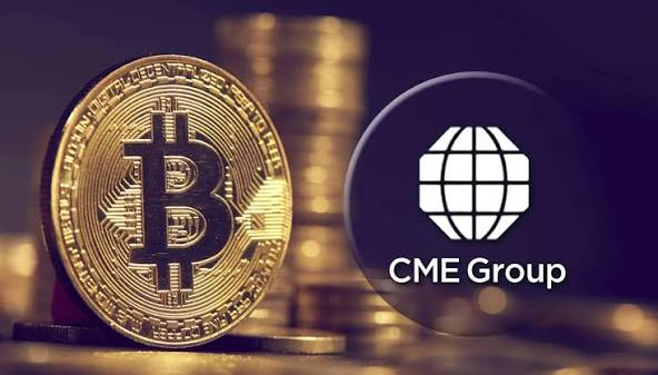 A gold Bitcoin token is displayed alongside the "CME Group" logo, visually representing the exchange's expansion of its crypto derivatives offerings—including the upcoming launch of Bitcoin Cash and Uniswap futures on October 19.