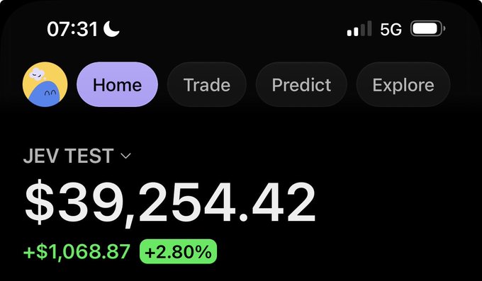 A screenshot of a crypto/trading app shows a portfolio labeled "JEV TEST" with a balance of $39,254.42, up $1,068.87 (+2.80%), tying into the "gm jev" post about a profitable trading setup.