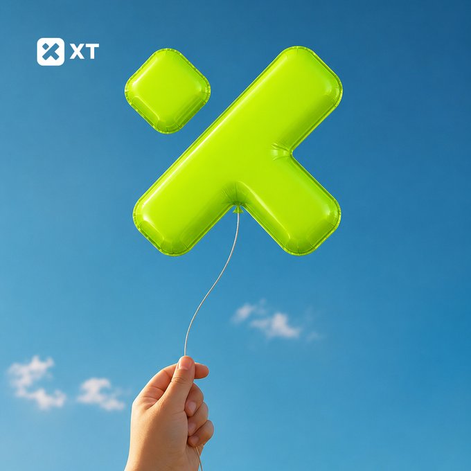A promotional image featuring a green inflatable balloon shaped like an 'X' against a blue sky, with the 'XT' logo in the upper left corner and a hand holding the balloon's string at the bottom.