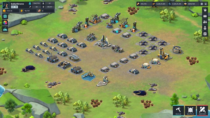 A screenshot of a strategy or city-building video game showing a base with various buildings, military units, and resource counters like '104/110' and '1.3K/5.0K' at the top.
