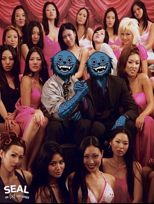 The image features two blue cartoon creatures with wide grins in business attire, surrounded by a group of women in pink dresses against a pink backdrop. The caption "SEAL ON [X] LEDGER" appears in the bottom left, complementing the post's playful "$SEAL" reference to the whimsical "happy hour" theme.