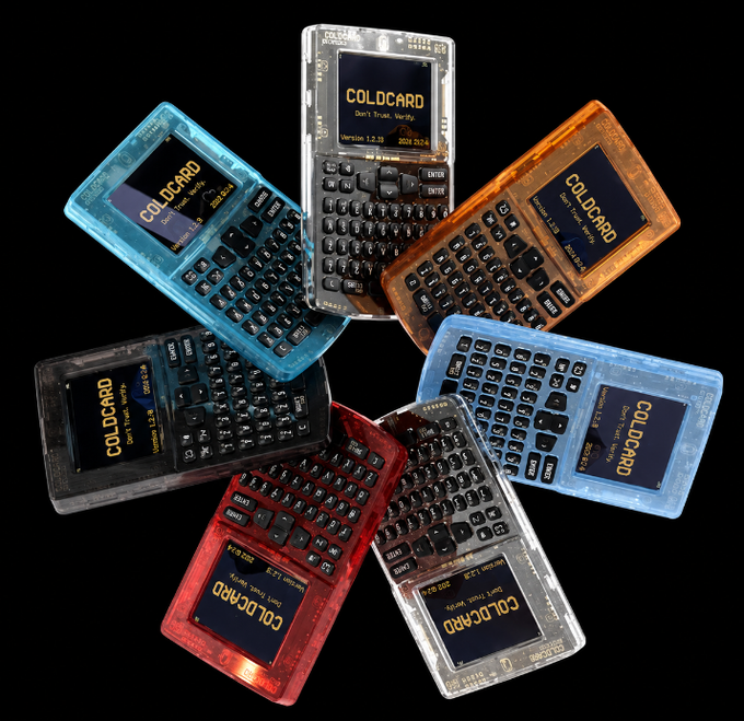 Several translucent handheld devices resembling calculators or PDAs are arranged in a circle on a black background, with their screens displaying 'COLDCARD Don't Trust. Verify.' along with a version number and date.