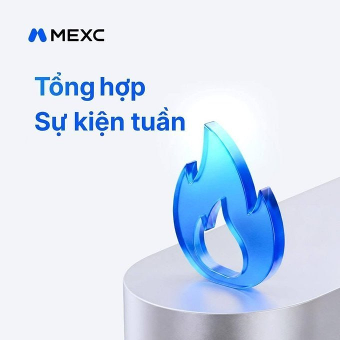 A promotional graphic featuring the MEXC logo and the Vietnamese text 'Tổng hợp Sự kiện tuần' next to a glossy, blue translucent 3D flame icon on a silver pedestal.