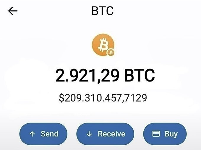 A screenshot of a cryptocurrency wallet displaying a balance of 2,921.29 BTC (valued at $209,310,457,7129), with Send, Receive, and Buy options. This is being used as visual "proof of funds" to promote a giveaway scam offering 0.1 BTC to a follower who likes, retweets, and comments — a classic social media fraud tactic leveraging a fabricated wealthy wallet image to lure victims.