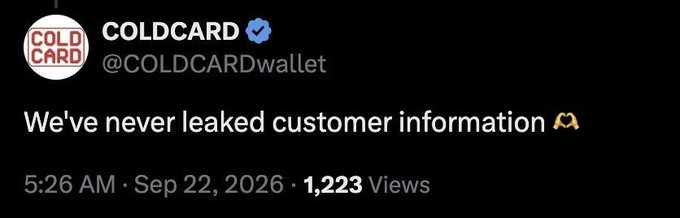 A Twitter/X post from verified account @COLDCARDwallet (COLDCARD) stating 'We've never leaked customer information' with a shrug emoji, posted at 5:26 AM on Sep 22, 2026, with 1,223 views.