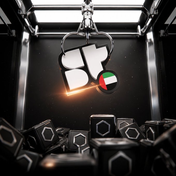A 3D rendered image showing a large metallic keychain-like pendant with the letters "BR" and a UAE flag emblem, suspended above a pile of dark hexagonal tokens inside a futuristic chamber.