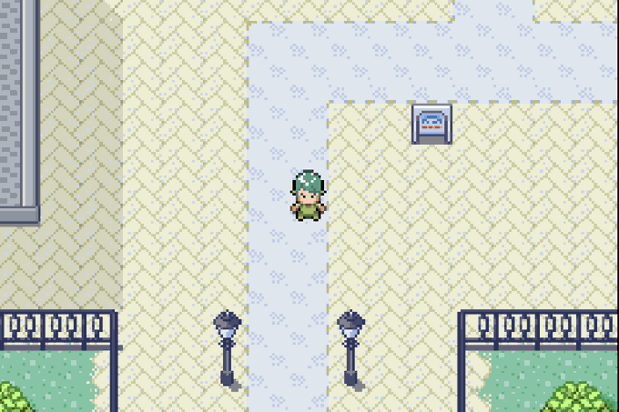 A pixel art scene from a retro video game showing a character with light blue hair walking along a tiled pathway between lampposts and fences.