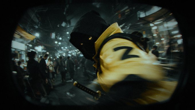 A hooded figure wearing a yellow jacket with a 'Z' symbol wields a sword in a stylized, motion-blurred action scene set in a nighttime city street.