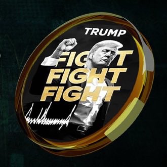 A gold-rimmed commemorative coin featuring Donald Trump with 'FIGHT FIGHT FIGHT' text, a signature, and 'TRUMP' labeling.