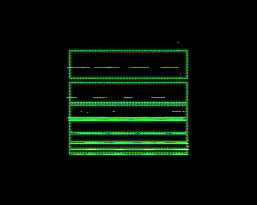 A green object sitting against a black background, which appears to be a book or something similar but without any visible text. There are no actions taking place as there is nothing within the image that can be touched or interacted with. The main focus of the image is on its visual elements and their relationship to the accompanying post.